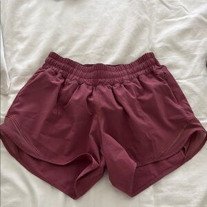 Women's lululemon dark pink/mauve low rise hotty hot shorts 4”
